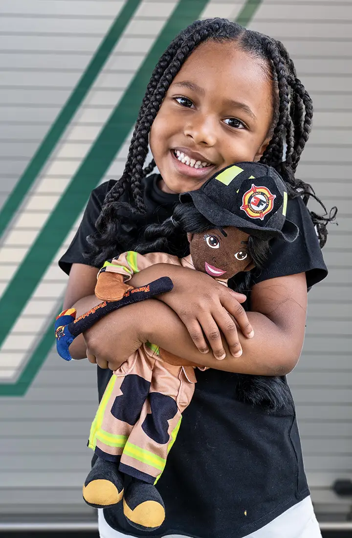 Molly-with-Firefighter-Doll